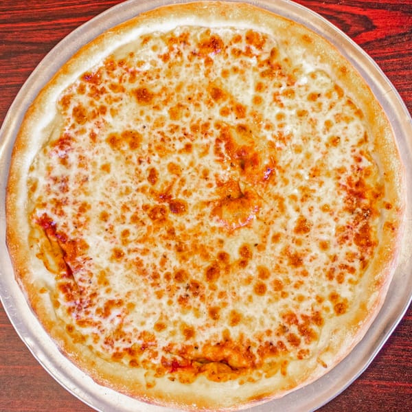 A Mr. Pizza Man cheese pizza with a golden crust, served on a metal pan.